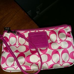 Pink coach wristlet